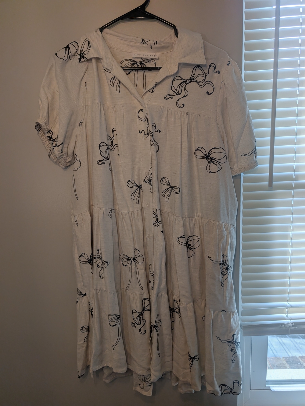 White Short-Sleeve Tiered Dress with Black Bow Print